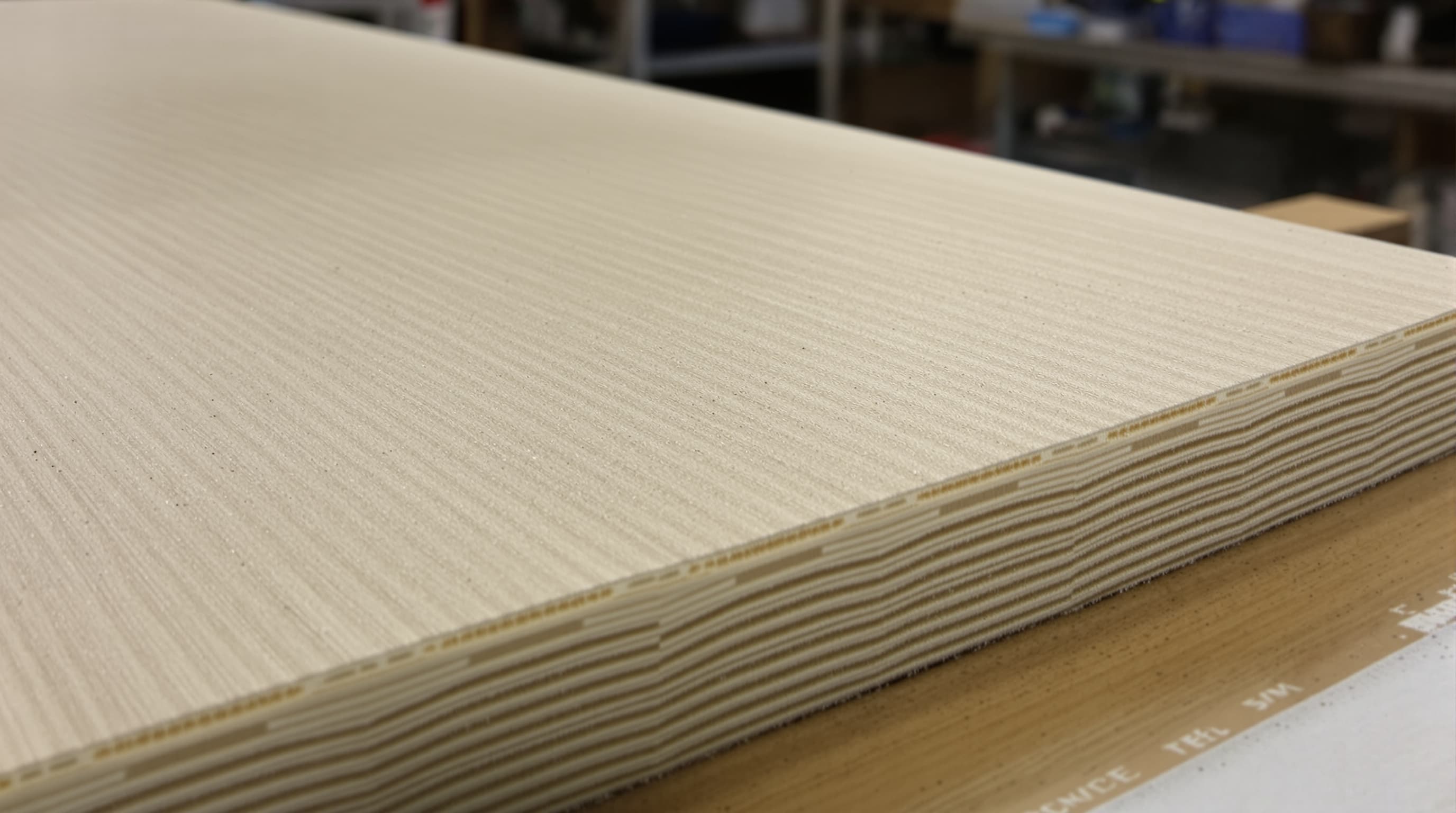 Sheet of hemp-fibre biocomposite board, cut edge showing the layers