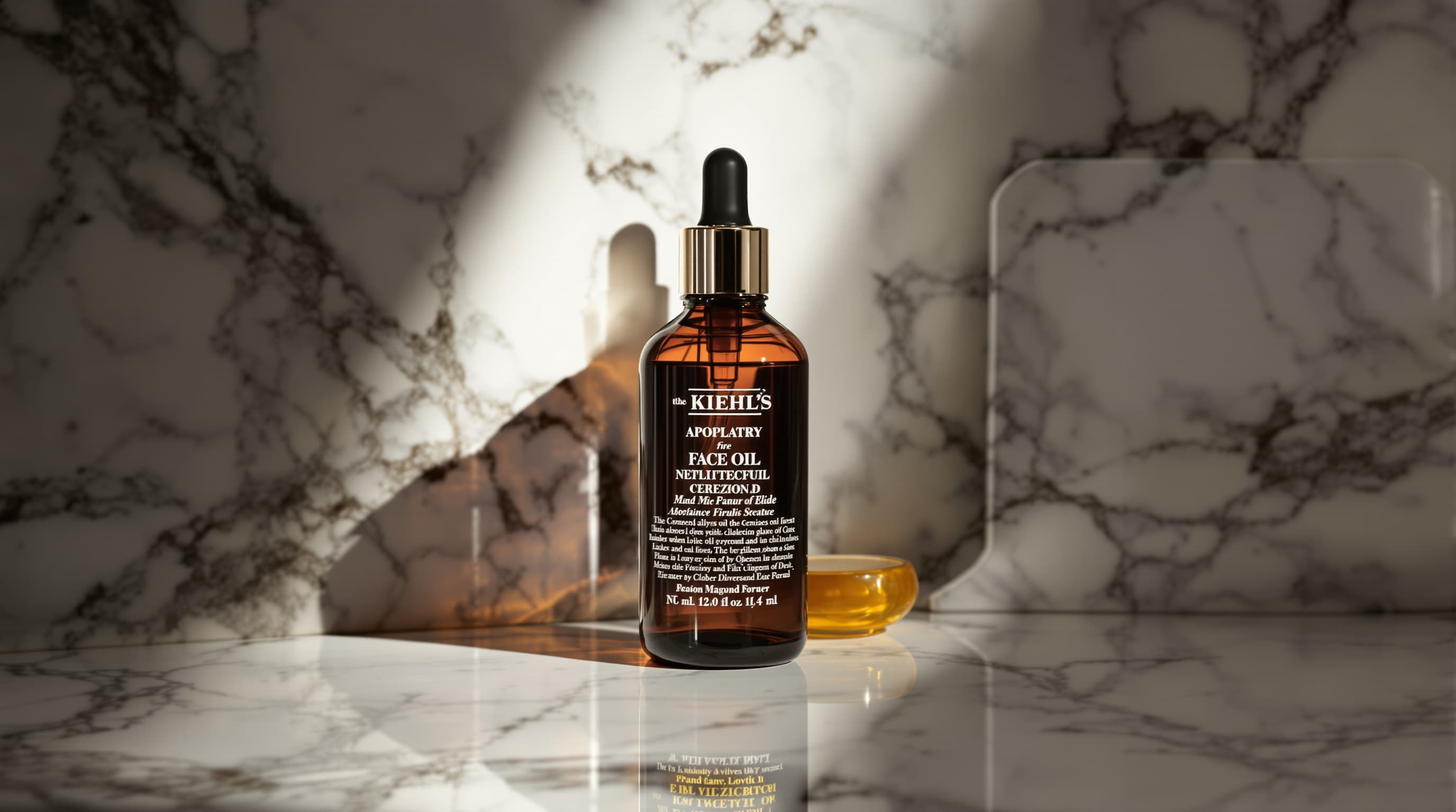 Kiehl's amber glass face oil on marble vanity