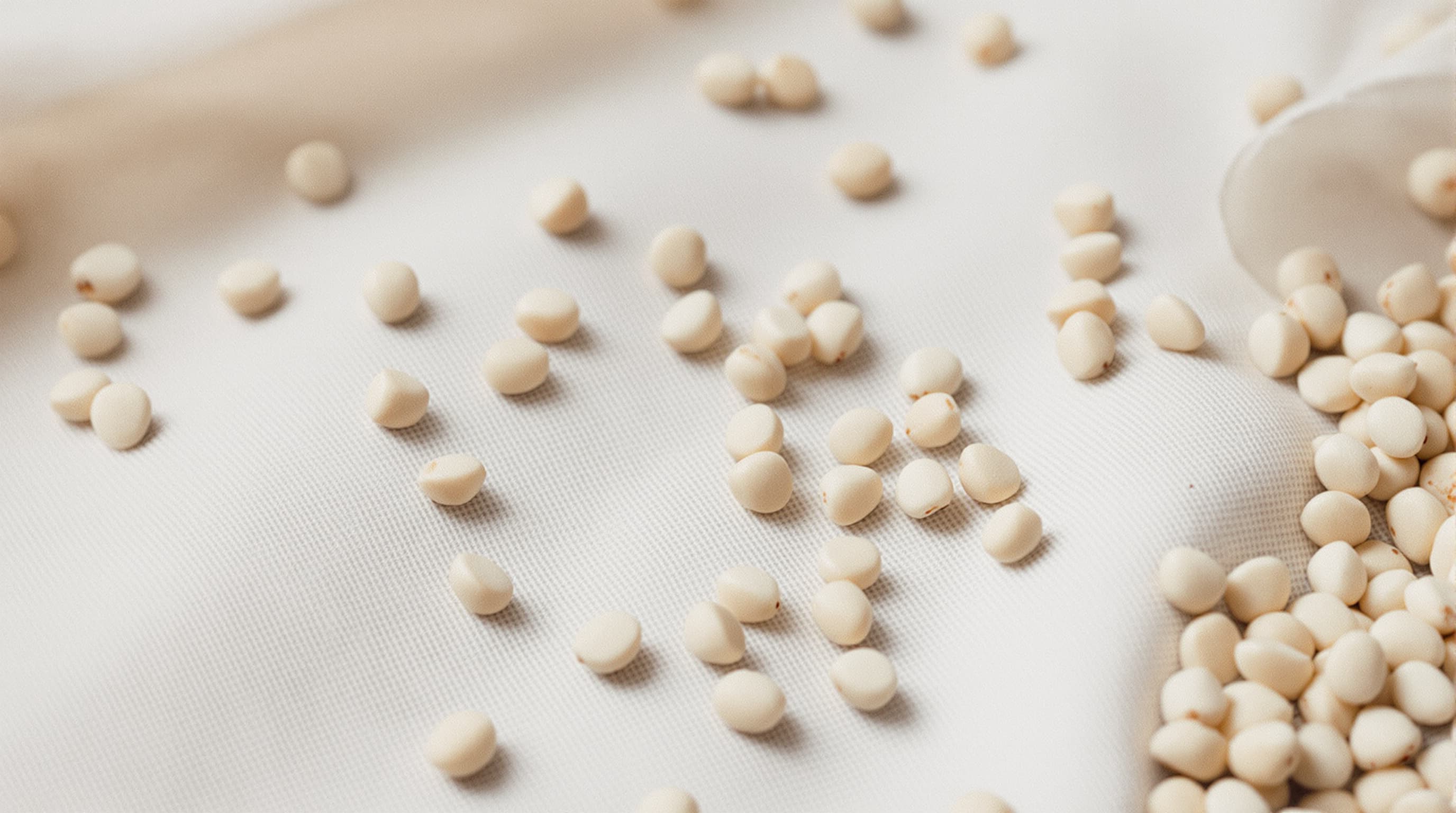 Cleaned hemp hearts close-up on linen